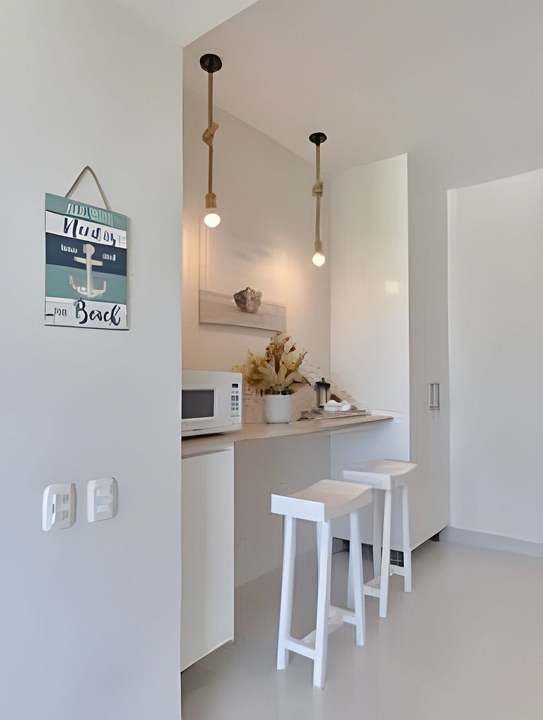 Caribbean Sunshine Breath Beachfront apt.