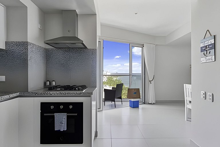 Caribbean Sunshine Breath Beachfront apt.