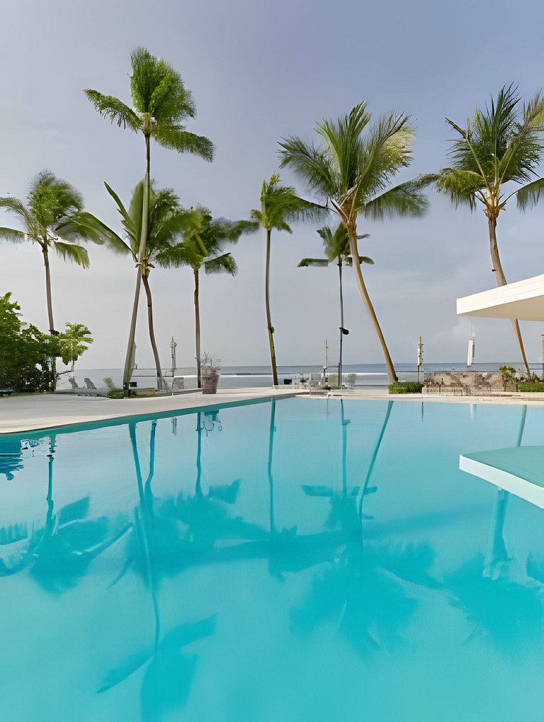 Caribbean Sunshine Breath Beachfront apt.