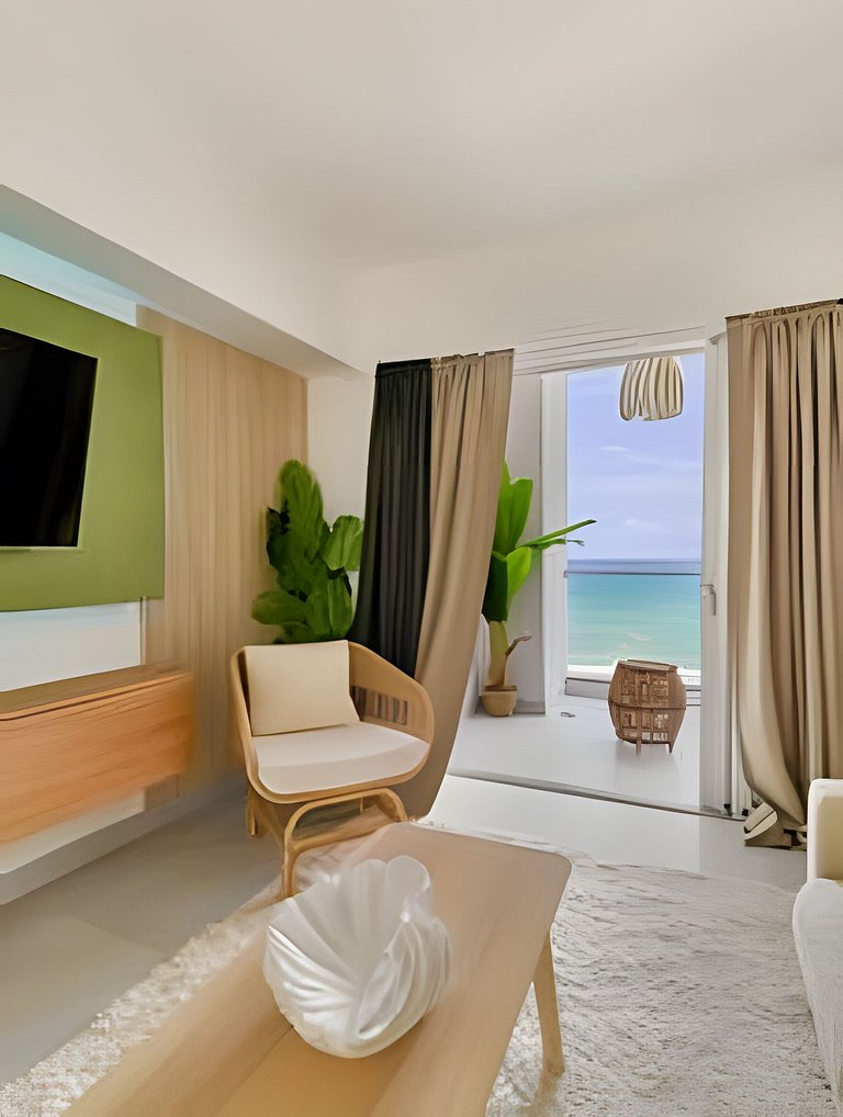 Caribbean Sunset Break Beachfront Apt.