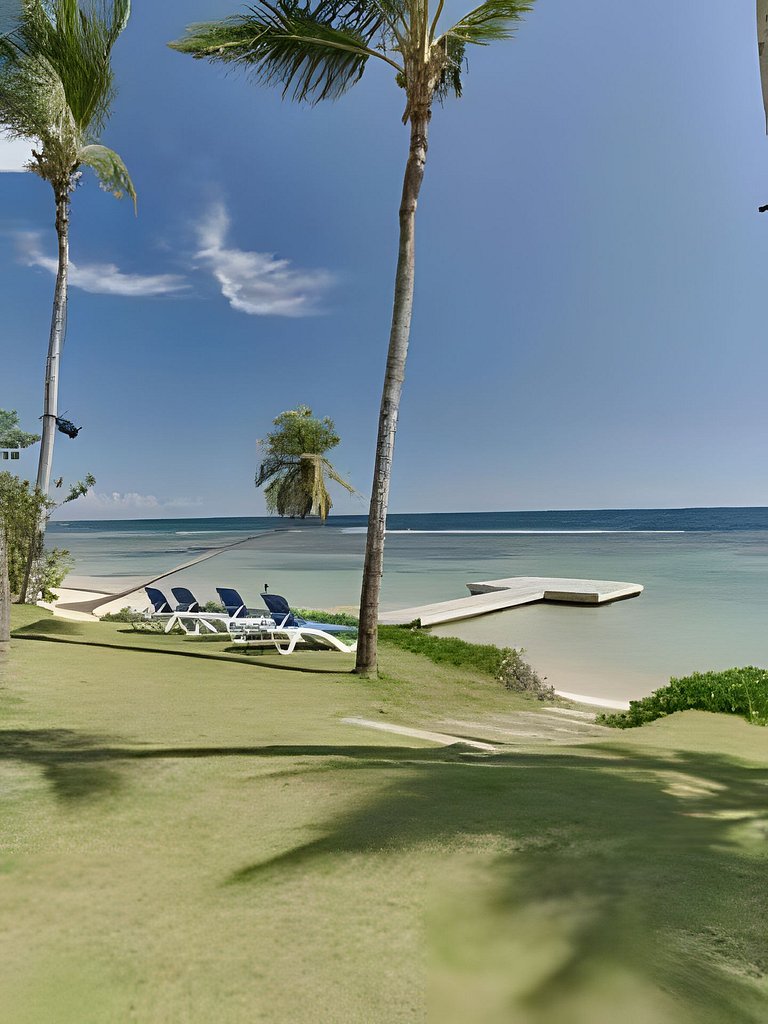 Caribbean Sunset Break Beachfront Apt.
